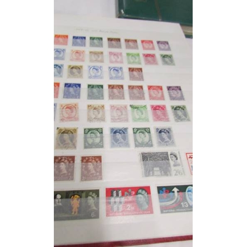 2219 - Three albums of UK and world stamps including Victorian penny reds.