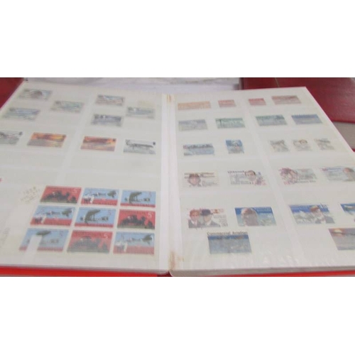 2221 - Four albums of world stamps including Poland, Iraq, USA, Australia, Fiji, Samoa, Vietnam, Malta, Bru... 