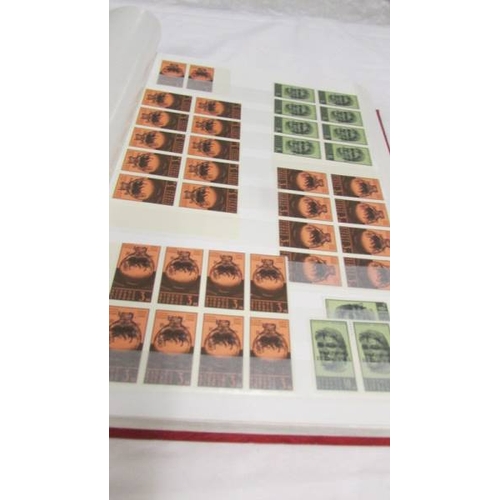 2221 - Four albums of world stamps including Poland, Iraq, USA, Australia, Fiji, Samoa, Vietnam, Malta, Bru... 