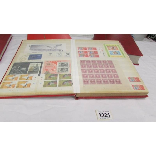 2221 - Four albums of world stamps including Poland, Iraq, USA, Australia, Fiji, Samoa, Vietnam, Malta, Bru... 