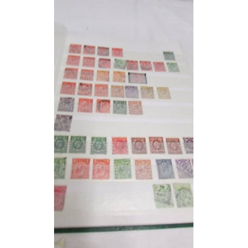 2224 - Two albums of UK and Channel Islands stamps including Victorian penny reds, a Victorian two penny bl... 