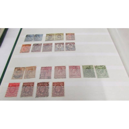 2224 - Two albums of UK and Channel Islands stamps including Victorian penny reds, a Victorian two penny bl... 