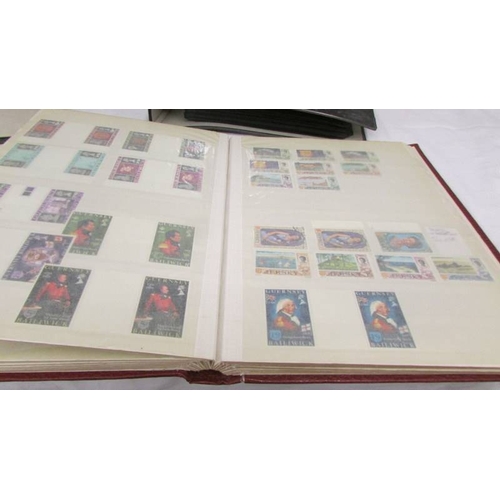 2225 - Two albums and a folder of UK and Channel Islands stamps.