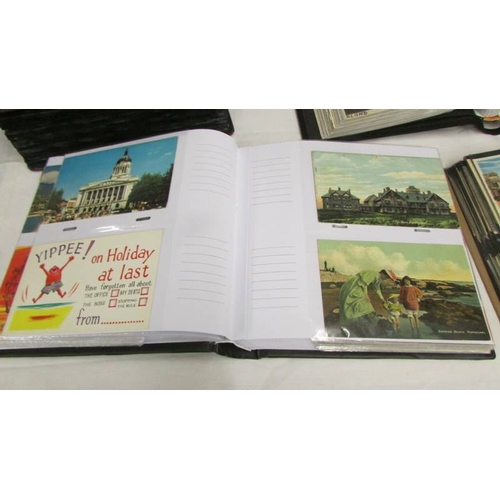 2229 - Approximately 760 assorted postcards in four albums.