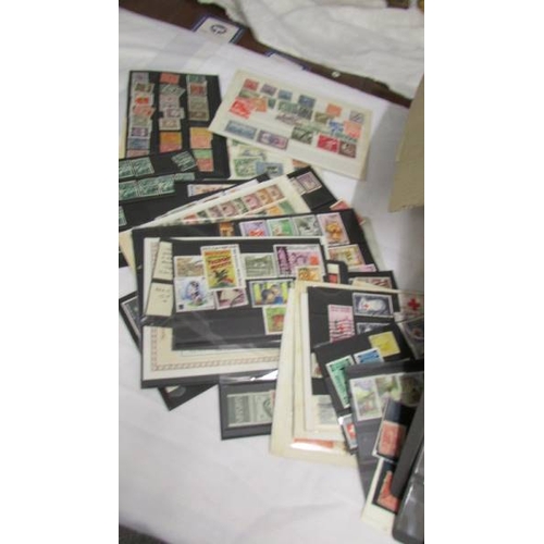 2230 - A box of assorted foreign stamps including Nicaragua, France, South Africa, Bhutan, Morocco, Bermuda... 