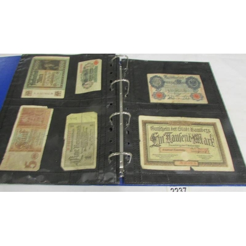 2237 - An album of bank notes including UK £1, UK 10/-, USA, Japan, Germany, France, Malaya etc.,