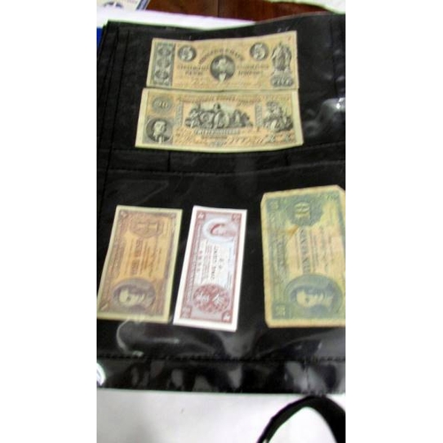 2237 - An album of bank notes including UK £1, UK 10/-, USA, Japan, Germany, France, Malaya etc.,