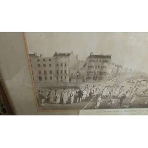 2325 - A 19th century framed and glazed engraving entitled 'The Chain Pier at Brighton with Characters'. 60... 