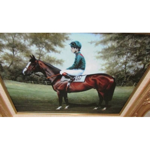 2330 - A print of a racehorse with jockey in a superb quality gilt frame.