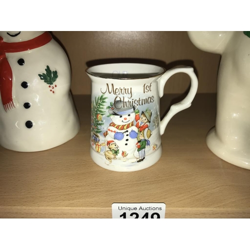 1249 - 6 Christmas plates, 2 snowmen money boxes & other Christmas items (2 shelves)