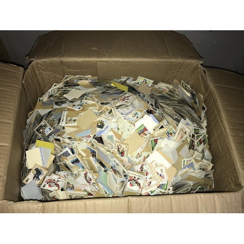 1264 - A large box of loose 'kiloware' stamps