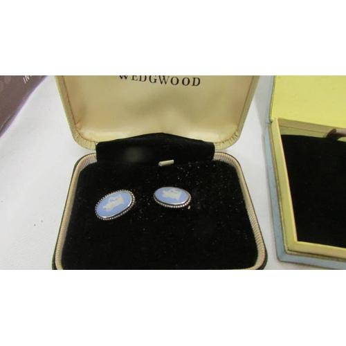 2084 - Three Wedgwood pendants, a Wedgwood brooch, a pair of Wedgwood earrings and a Wedgwood ring.