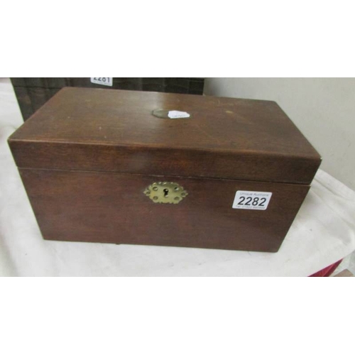 2282 - A Victorian mahogany tea caddy.