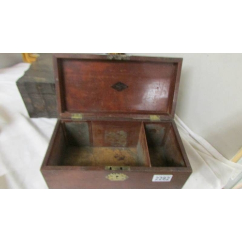 2282 - A Victorian mahogany tea caddy.