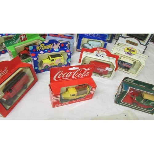 2286 - In excess of 30 boxed die cast trade vehicles including Dr Pepper, Pepsi, Guinness etc.,