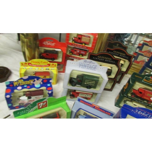 2286 - In excess of 30 boxed die cast trade vehicles including Dr Pepper, Pepsi, Guinness etc.,