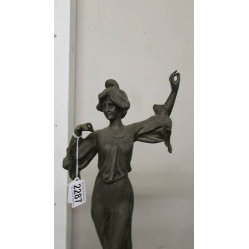 2287 - An art nouveau female figure (damage to fingers on right hand).