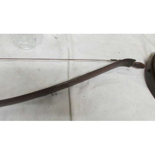 2290 - A good antique bow with fitted arrow holder to front, (no arrows) (Collect only)