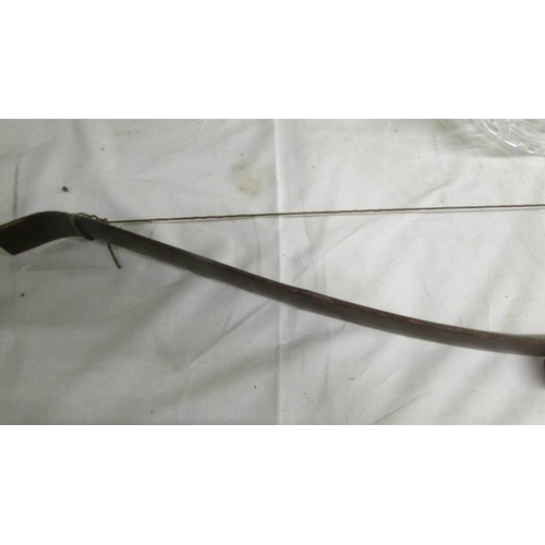 2290 - A good antique bow with fitted arrow holder to front, (no arrows) (Collect only)