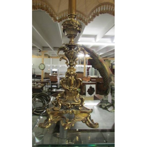 2352 - A good quality heavy brass table lamp with good quality fringed shade. (Collect only)