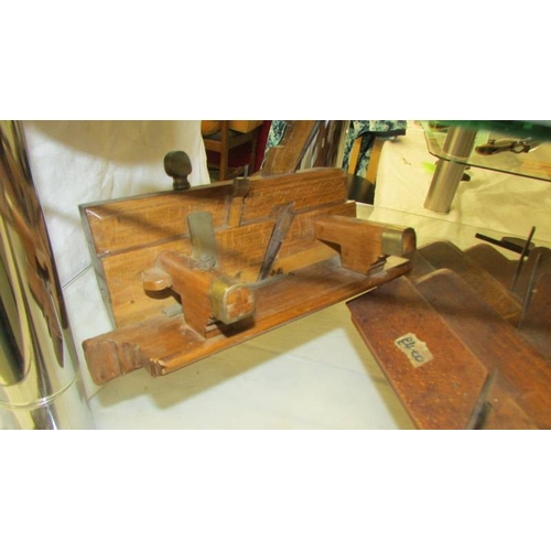 2369 - Ten antique wood working planes.