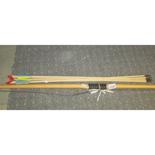 2380 - An English long bow with arrows.  (Collect only)