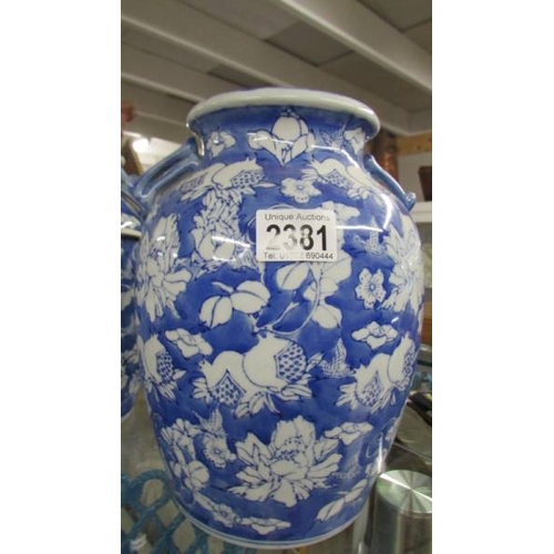 2381 - A pair of blue and white Chinese style table lamp bases (one with fittings, one without),  (Collect ... 