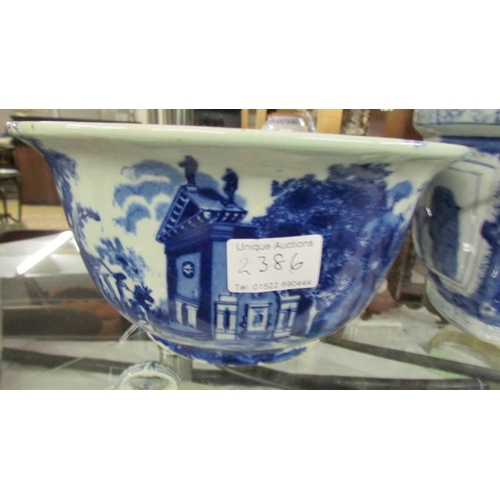 2386 - A large blue and white bowl together with a blue and white planter.