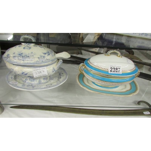 2387 - A Royal Worcester sauce tureen and a blue and white sauce tureen with ladle.