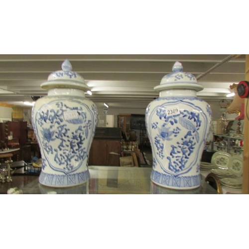 2389 - A large pair of Chinese unmarked ginger jars, 40 cm tall.  (Collect only)