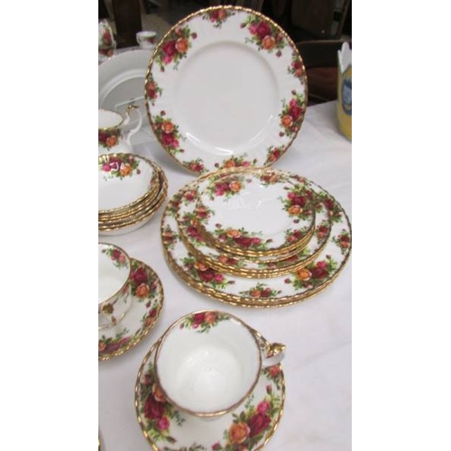 2393 - A good lot of Royal Albert Old Country Roses tea and dinner ware comprising meat platter, tureen, sa... 