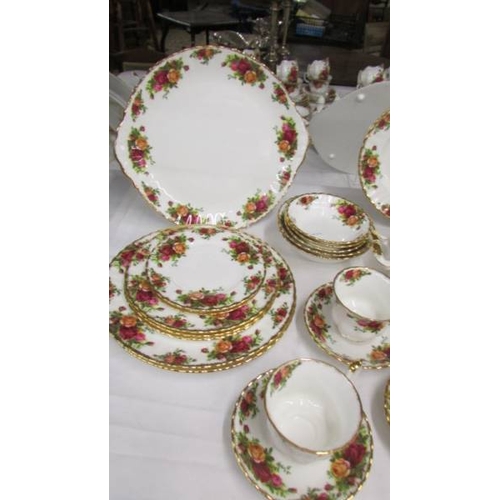 2393 - A good lot of Royal Albert Old Country Roses tea and dinner ware comprising meat platter, tureen, sa... 