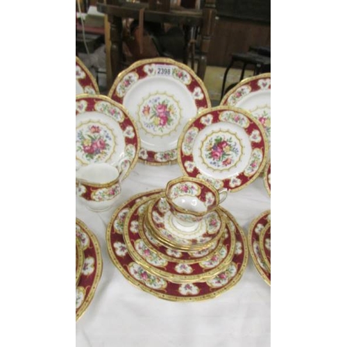 2398 - In excess of 30 pieces of Royal Albert 'Lady Hamilton' pattern table ware comprising:- 6 dinner plat... 