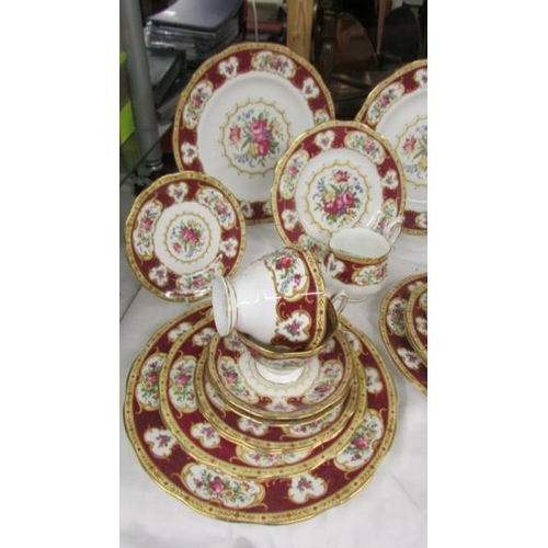 2398 - In excess of 30 pieces of Royal Albert 'Lady Hamilton' pattern table ware comprising:- 6 dinner plat... 