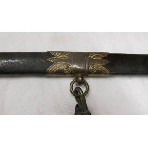 2406 - A mid-Victorian naval sword.  (Collect only)