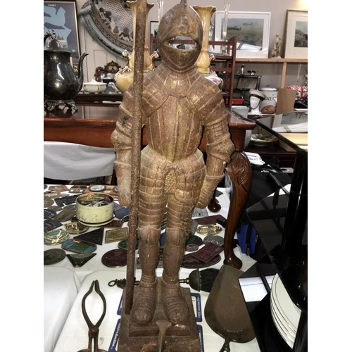 1361 - A cast iron Knight in armour fire side assistant & selection of fire tools A/F (height 66cm)