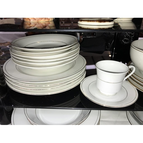 1366 - A mixed lot of white dinner ware including tureen (approximately 60 pieces)