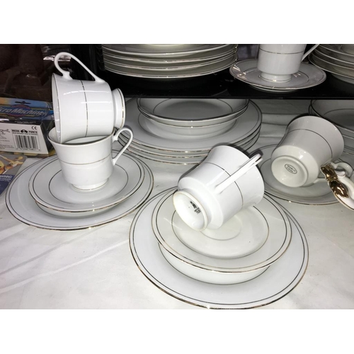 1366 - A mixed lot of white dinner ware including tureen (approximately 60 pieces)