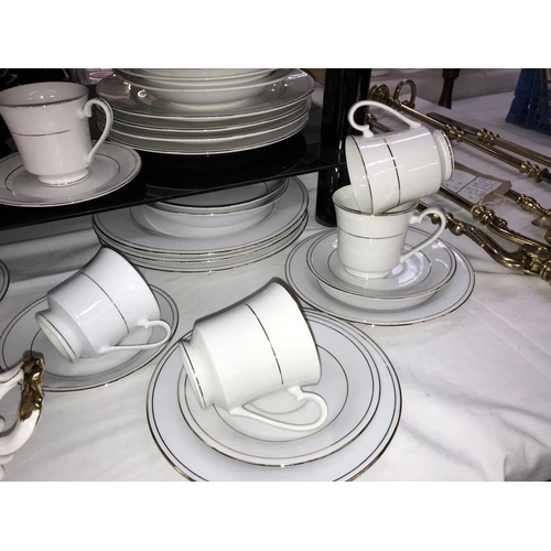 1366 - A mixed lot of white dinner ware including tureen (approximately 60 pieces)