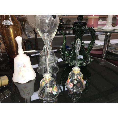 1371 - A selection of glass ware including ship in bottle & light bulb, bells, vases & ornate green oil bot... 