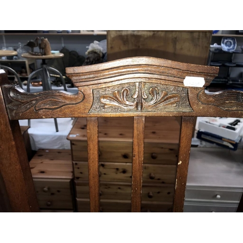 1398 - A pair of Edwardian mahogany hall chairs