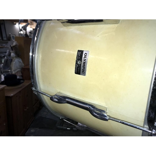 1406 - A cased Olympic Premier marching drum & accessories