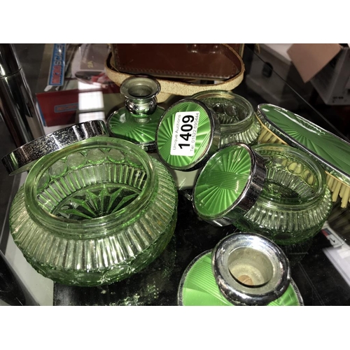 1409 - An art deco green glass chrome dressing table set