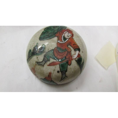 2102 - A Chinese/Japanese ginger jar depicting fighting figures. (Collect only)