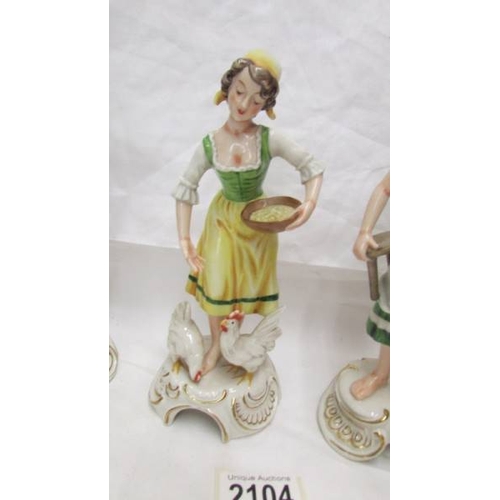 2104 - A set of four Goebel figurines.