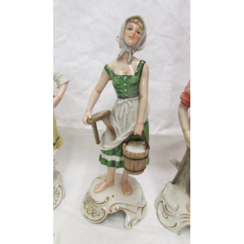 2104 - A set of four Goebel figurines.