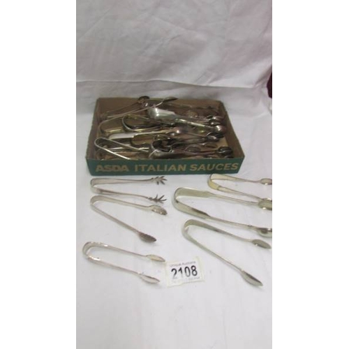 2108 - 25 pairs of EPNS sugar tongs.