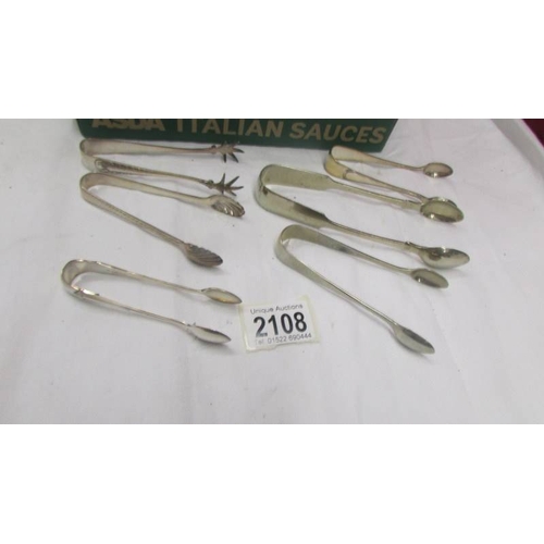 2108 - 25 pairs of EPNS sugar tongs.