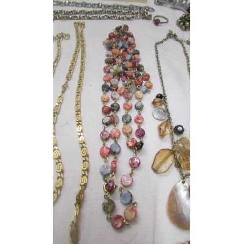 2113 - A mixed lot of necklaces, bracelets etc.,