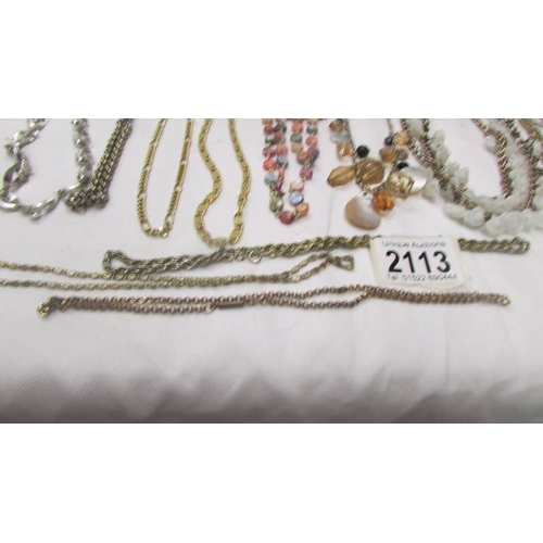 2113 - A mixed lot of necklaces, bracelets etc.,